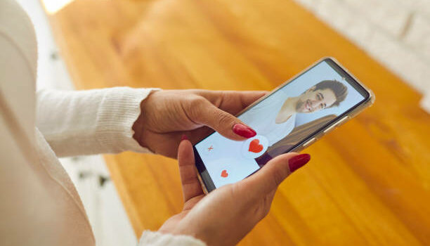 We Can’t Predict the Future, So Enjoy the Present woman scrolling through online dating profiles